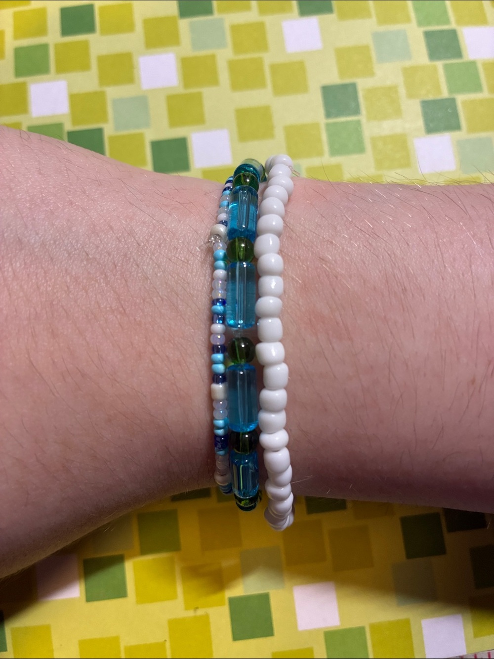 3 blue and green themed bracelets